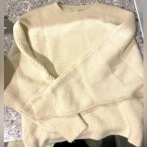 Cozy sweater with dropped shoulder and loose sleeve